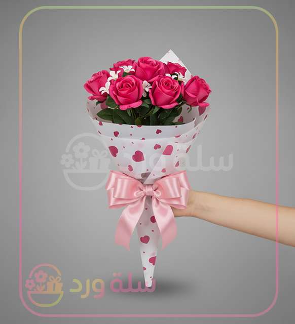 باقة همسة حب – ورد صناعي فوشيا بتغليف أبيض رومانسي